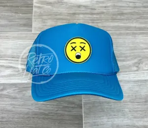 Drunken Smiley Face Emoji Patch on Turquoise Meshback Trucker Hat