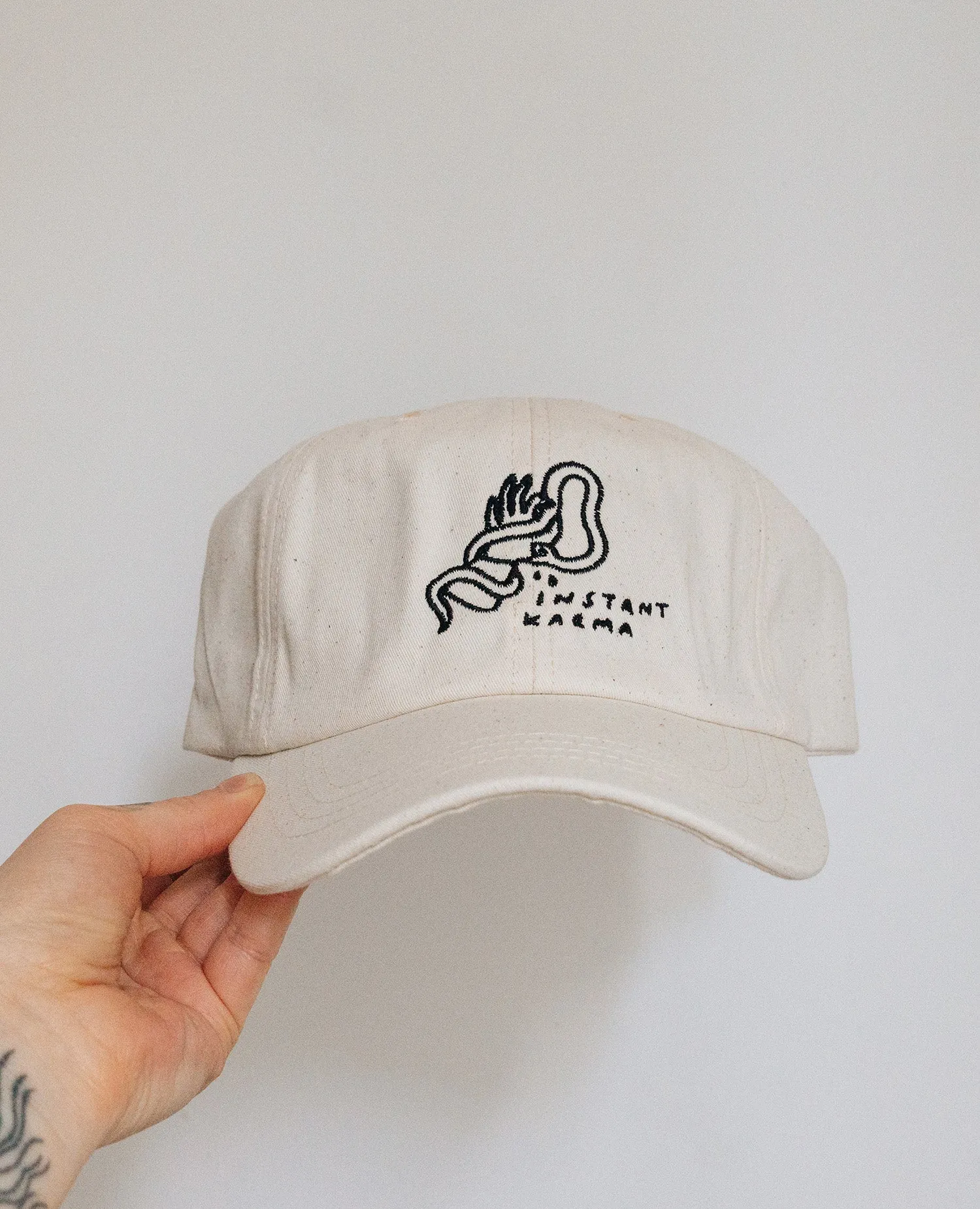 Instant Karma Cap