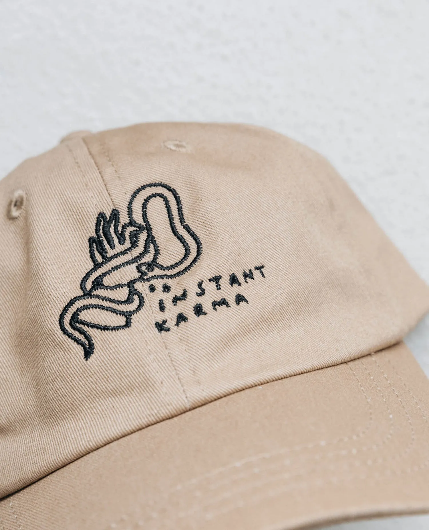 Instant Karma Cap