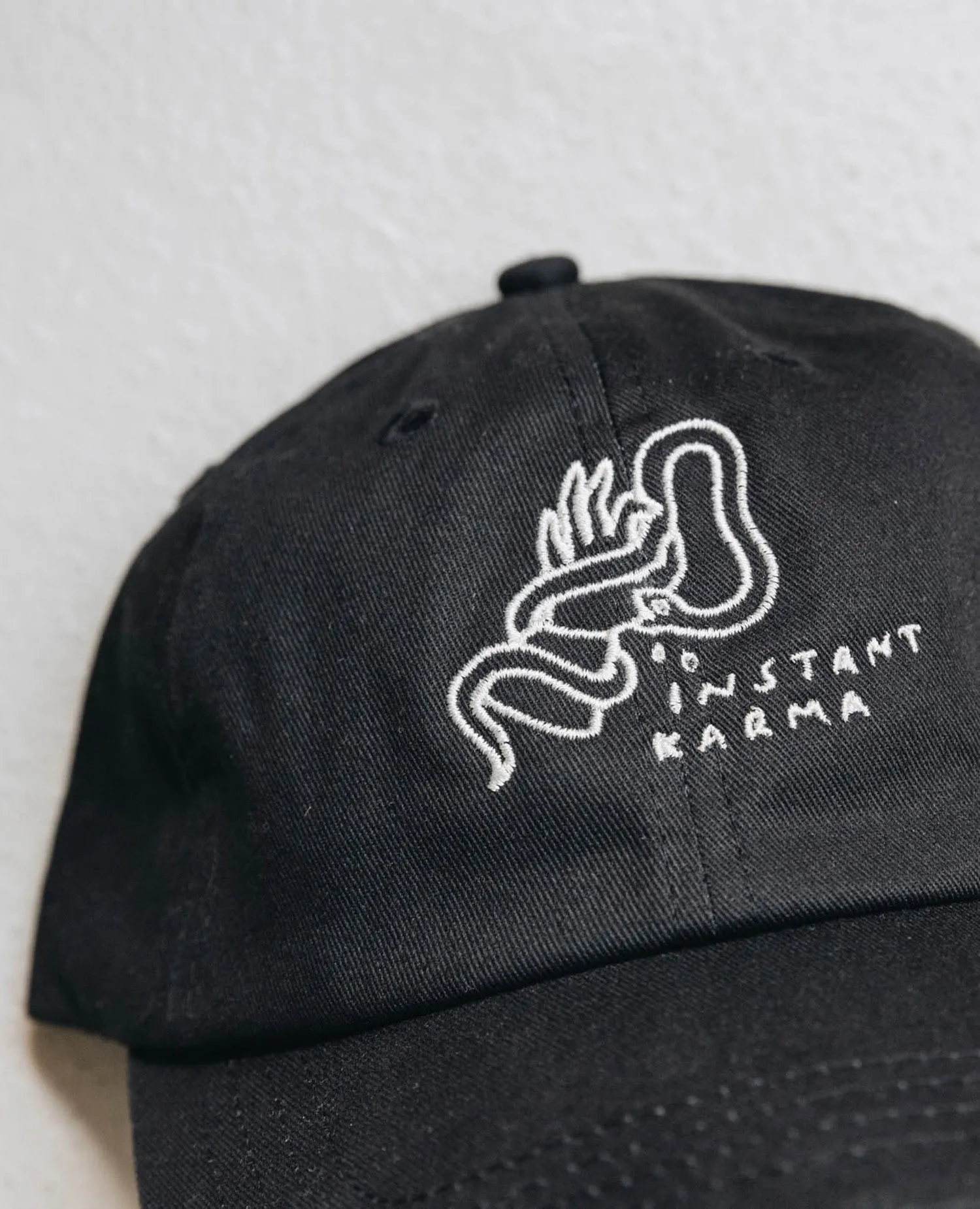 Instant Karma Cap